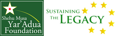 A rectangular logo divided into two sections. The left side is green with a white star in the corner and yellow arc. Text reads: "Shehu Musa Yar'Adua Foundation." The right side is black with green and yellow text reading: "Sustaining the LEGACY," surrounded by six yellow stars arranged in a semi-circle.